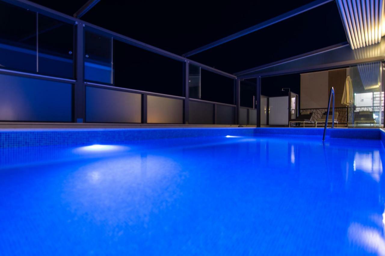 23 A Heated Pool Apartment